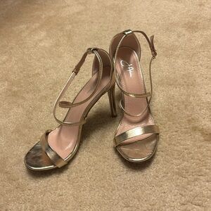 Strappy gold high heel dress sandal. Size 8